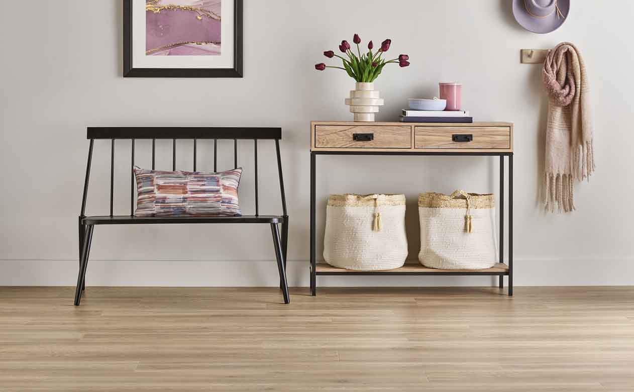 light wood look laminate flooring in entryway