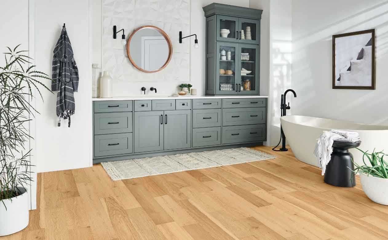 Engineered hardwood bathroom with tub. 